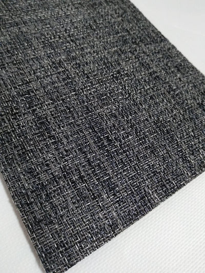 Premium woven vinyl rug with braided texture, durable and elegant for indoor or outdoor use.
