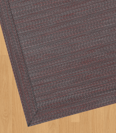 Alfombra vinilo tejido premium DB5158A en color neutro sobre suelo de madera.